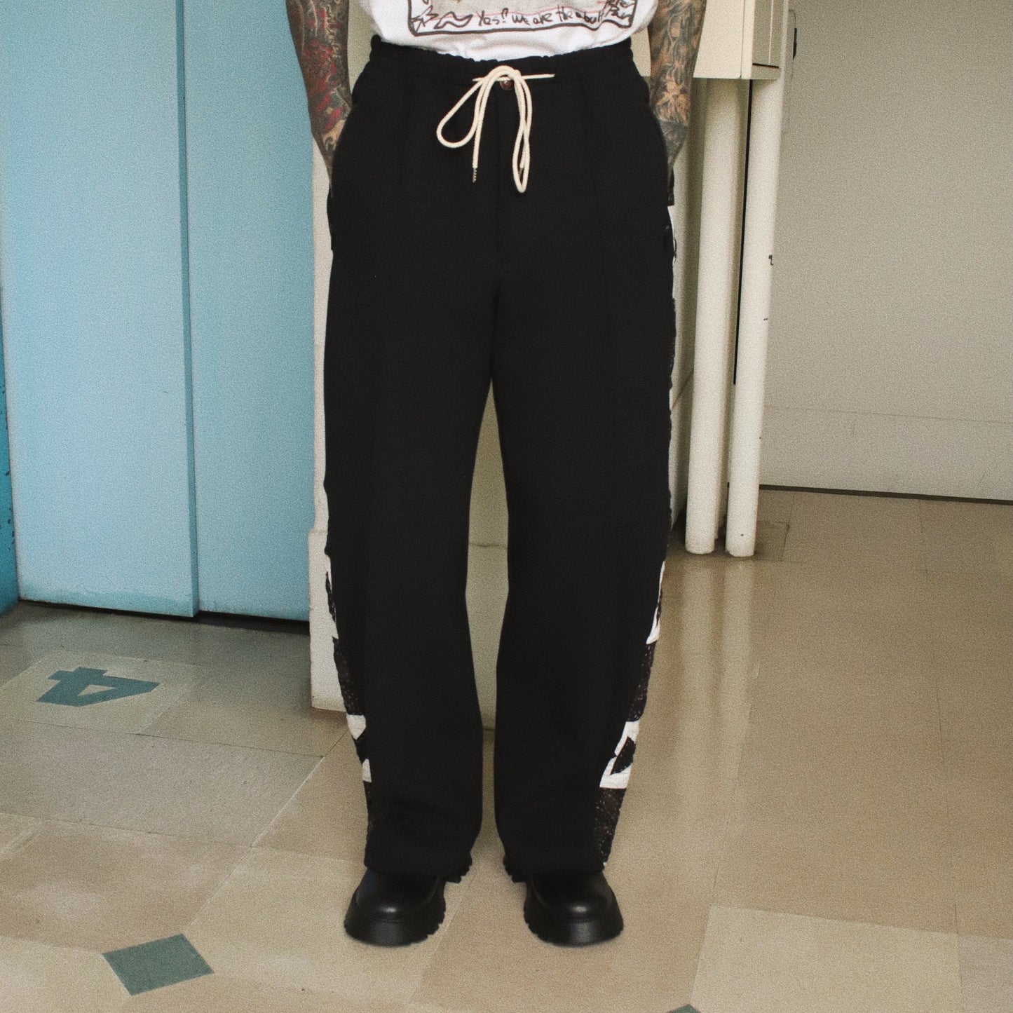 Hand patchwork quilted track pants Black