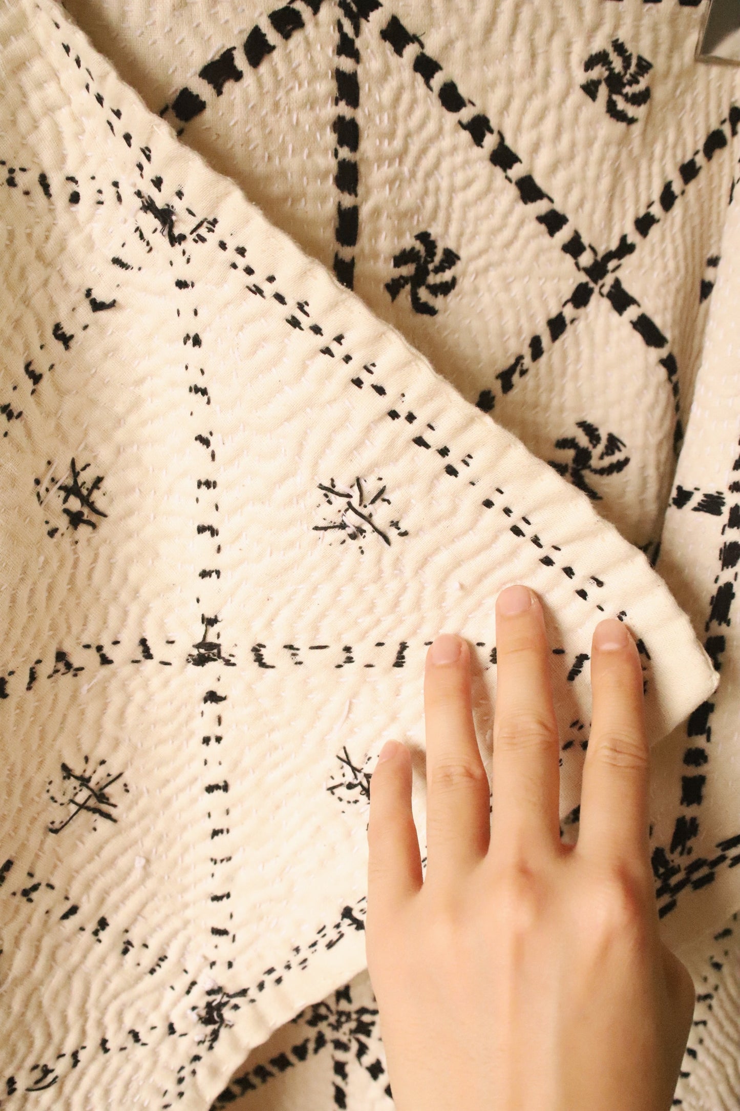 White kantha rug Black