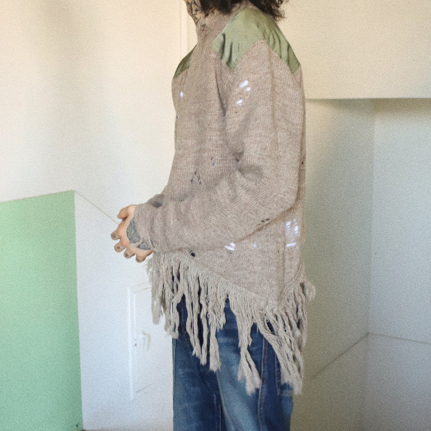 Fringed and destroyed knit Beige