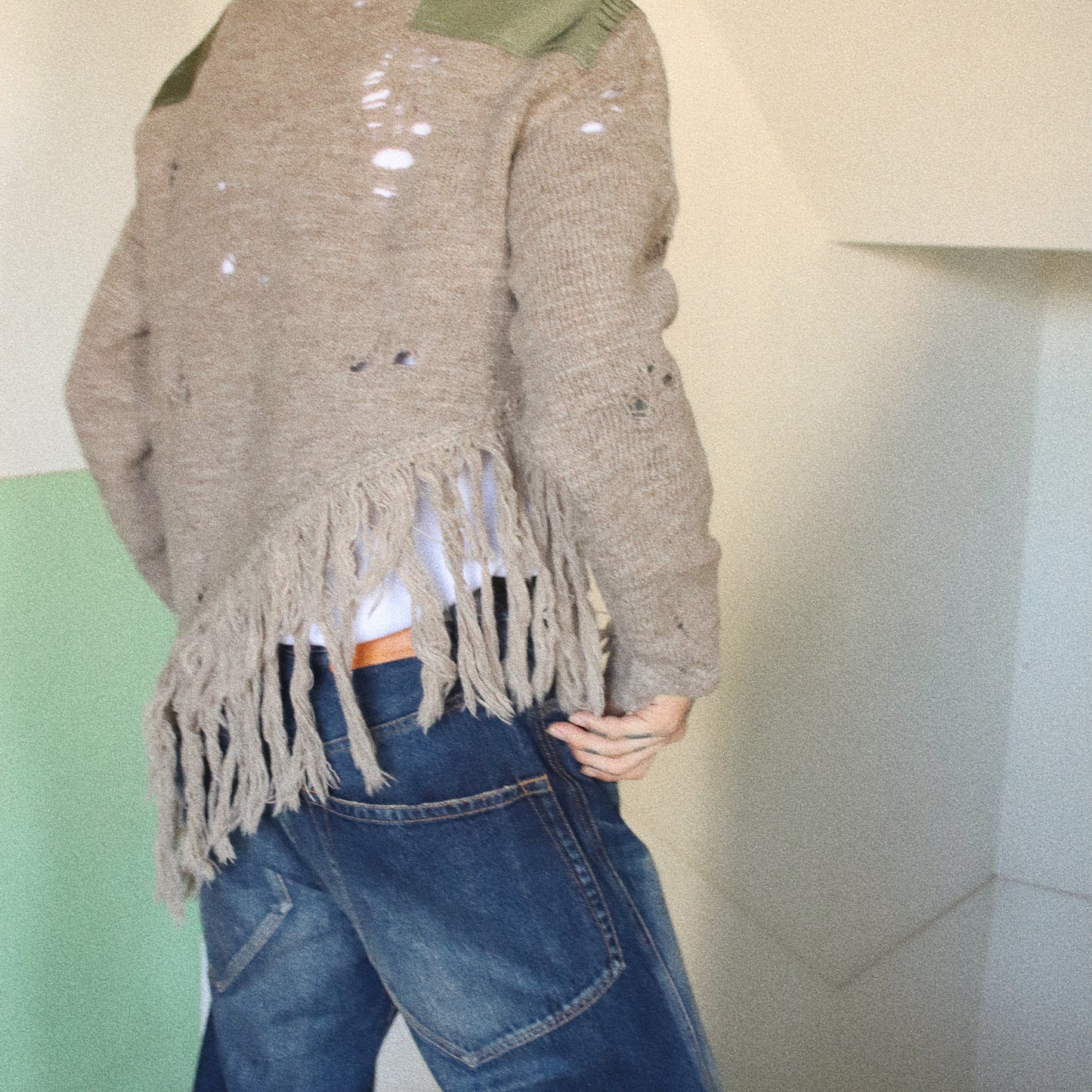 Fringed and destroyed knit Beige