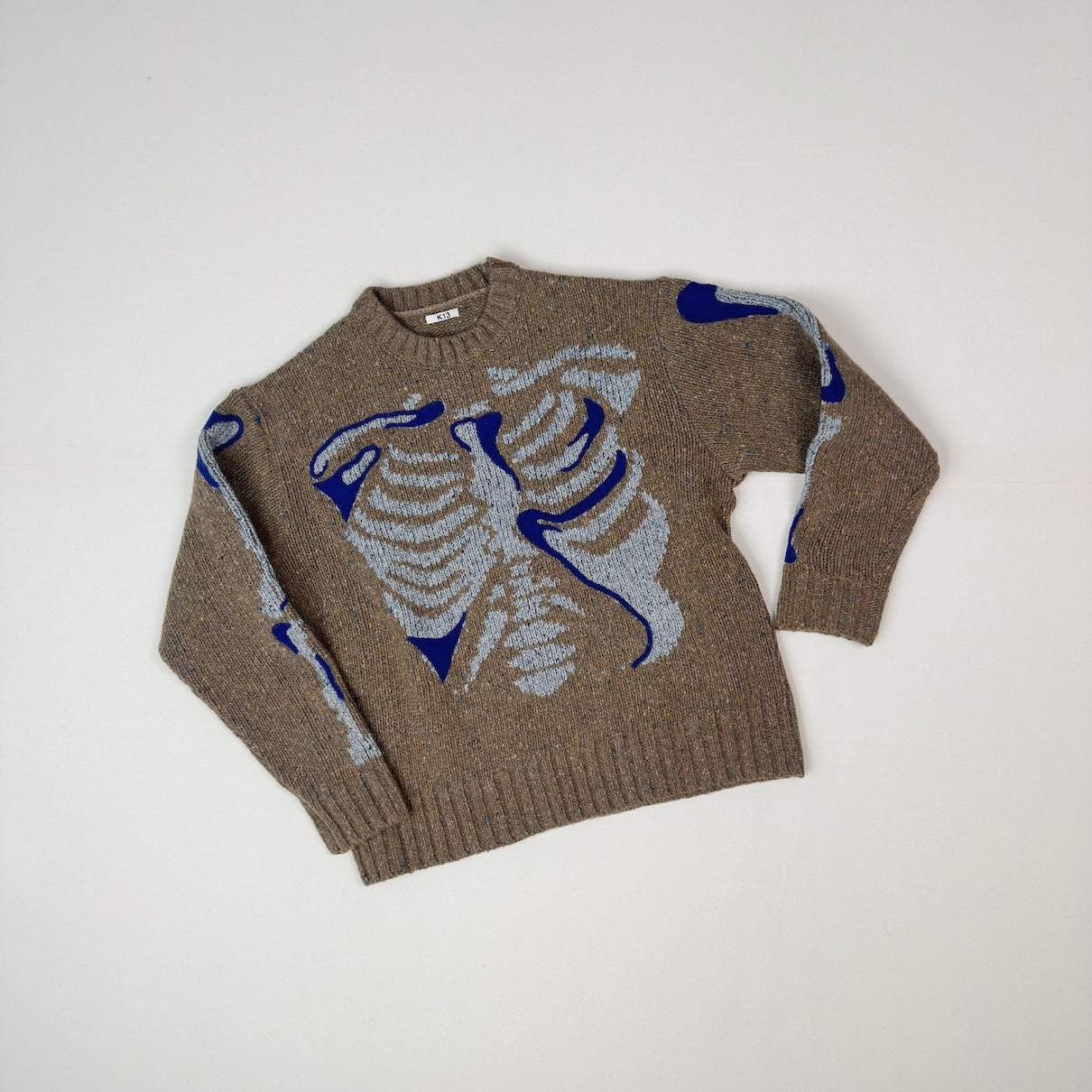 Needle punched knit Brown