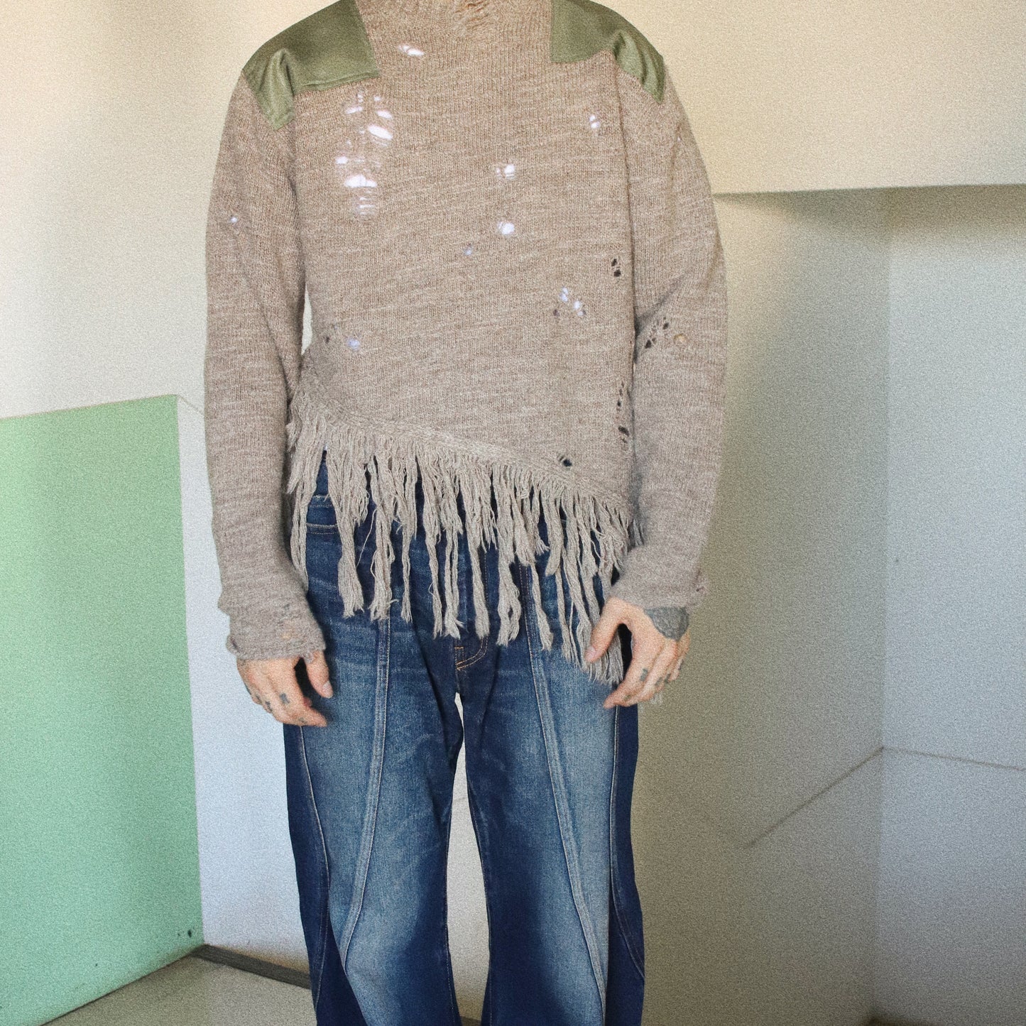 Fringed and destroyed knit Beige