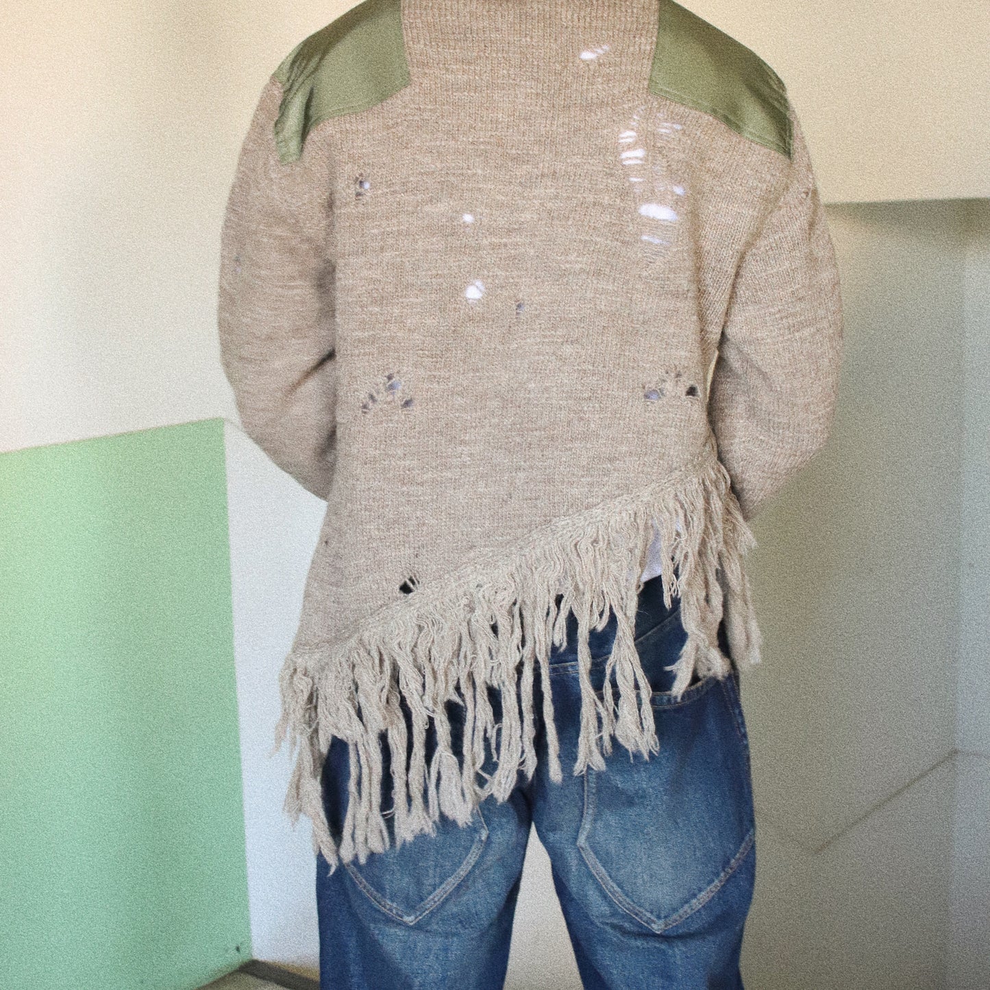 Fringed and destroyed knit Beige