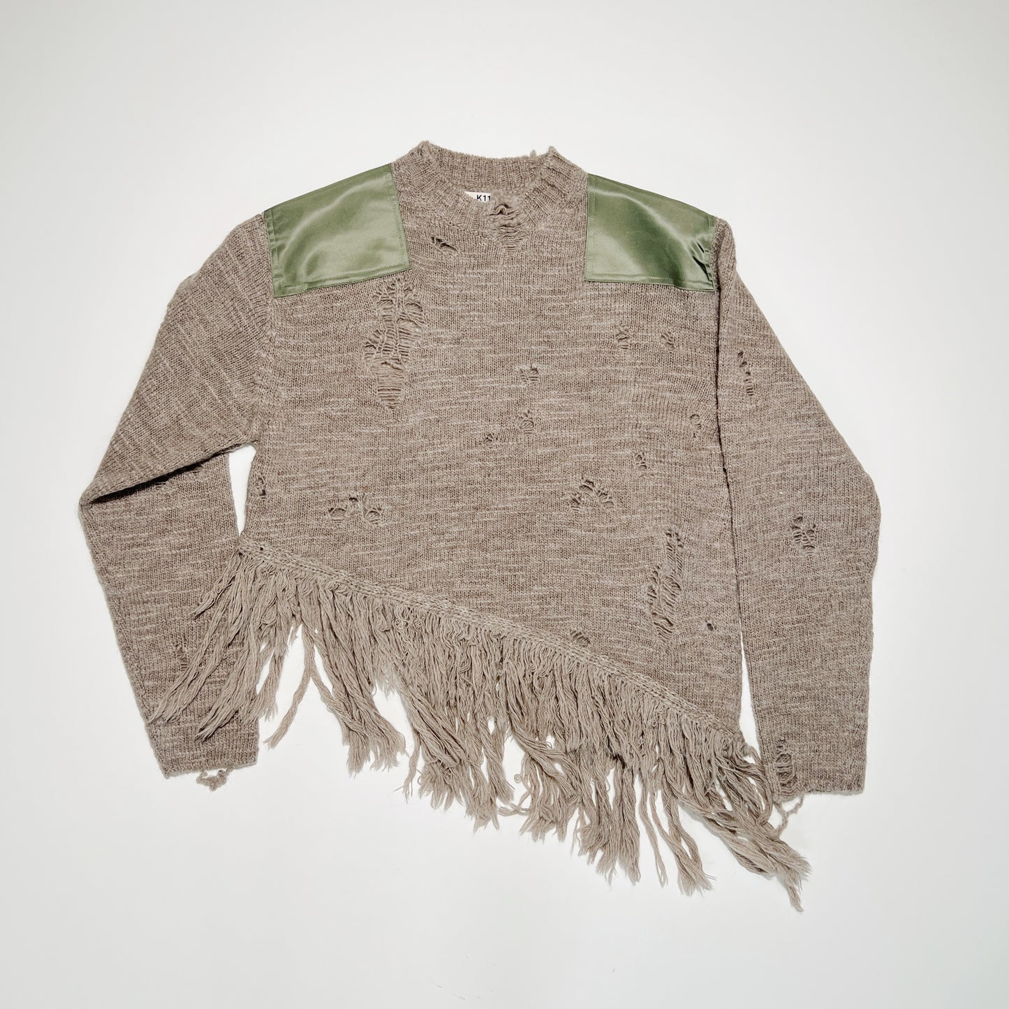 Fringed and destroyed knit Beige